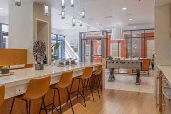 Mingle lounge with gaming area, hdtv, and ample comfortable seating